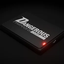 小型の黒いUSBデスクトップリーダーKBR1。インジケーターのランプがレッドに点灯している