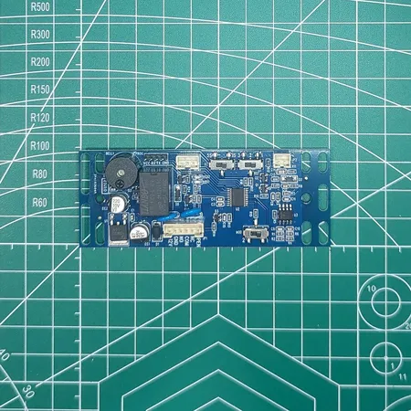 Top-down view of the xEM Access Controller board on a measurement mat