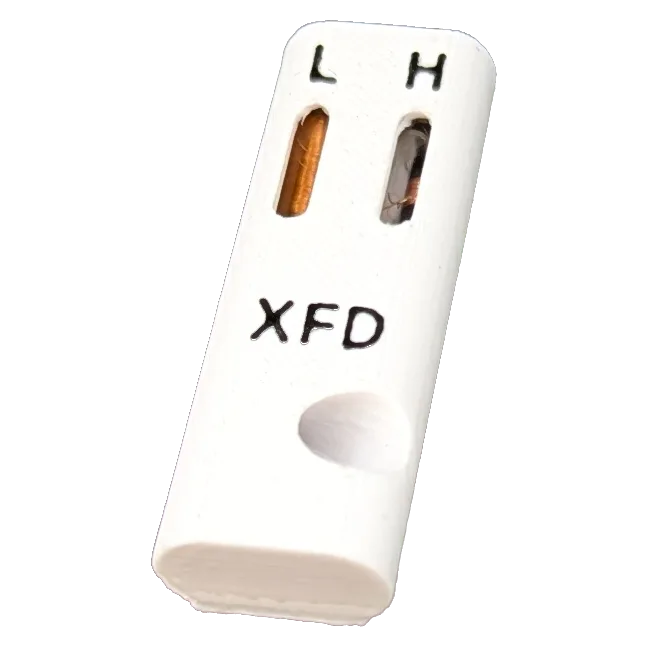 Combination field detector keychain, a white wand marked XFD with separate L and H indicator windows